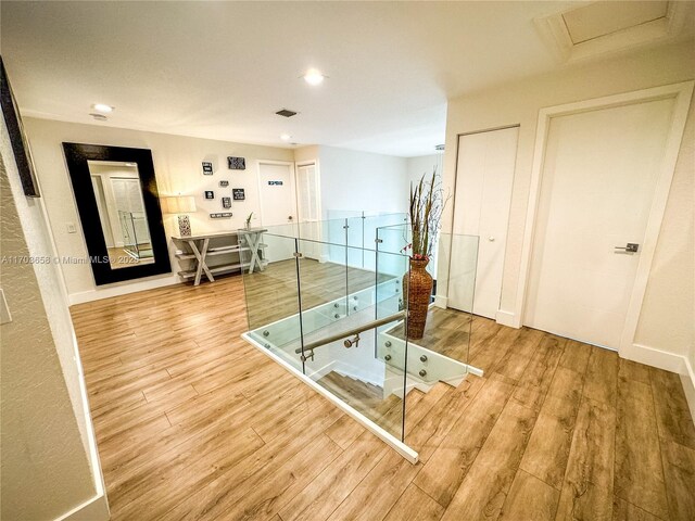 workout room with hardwood / wood-style floors