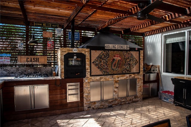 view of patio with ceiling fan