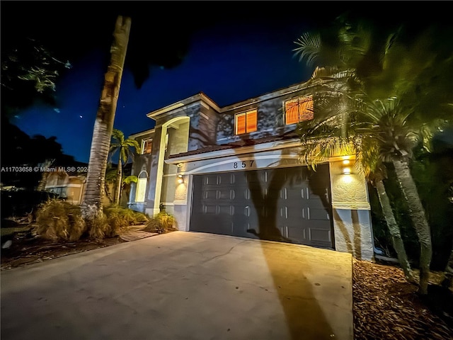 view of front of property featuring a garage