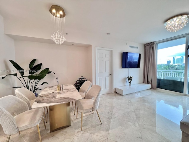1755 E Hallandale Beach Blvd Unit 405E, Hallandale Beach, FL 33009 - dining area with light marble finish flooring