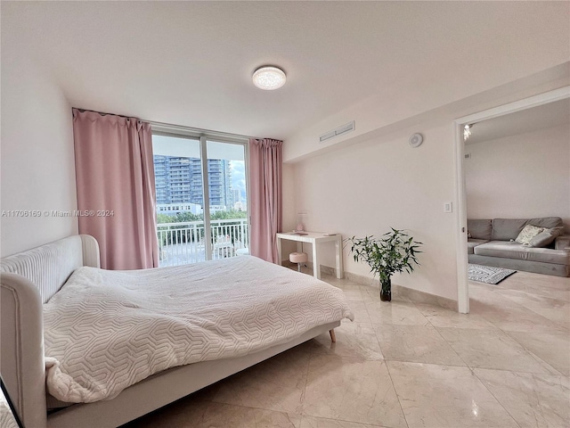 1755 E Hallandale Beach Blvd Unit 405E, Hallandale Beach, FL 33009 - bedroom with access to exterior and expansive windows