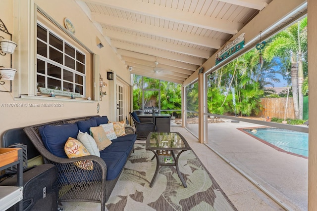 view of patio / terrace featuring an outdoor living space and a fenced in pool