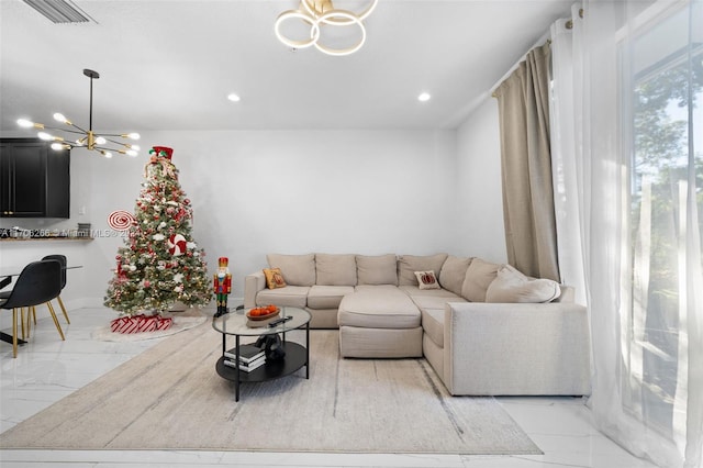 living room with a chandelier