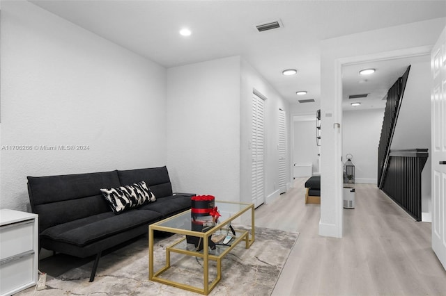 living room featuring light wood-type flooring