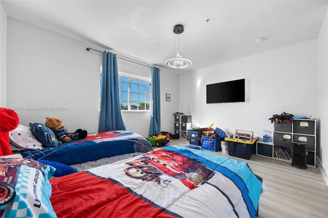 bedroom featuring hardwood / wood-style floors