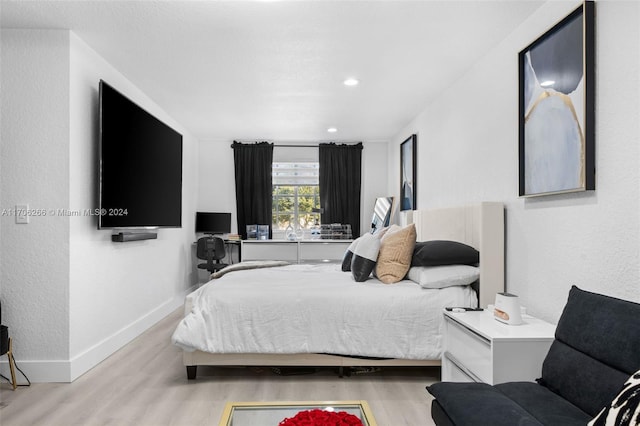 bedroom featuring light wood-type flooring