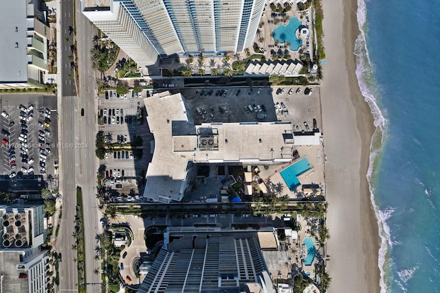 aerial view featuring a beach view and a water view