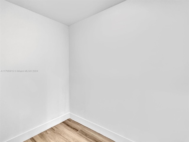 unfurnished room featuring light hardwood / wood-style floors