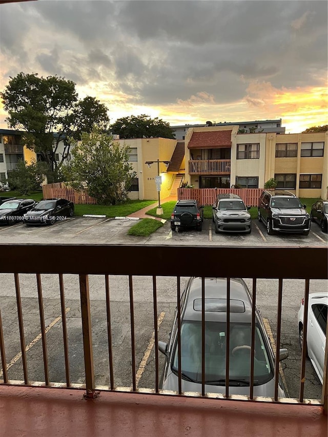 view of balcony at dusk