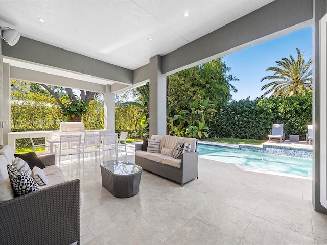 view of patio featuring a fenced in pool and an outdoor living space