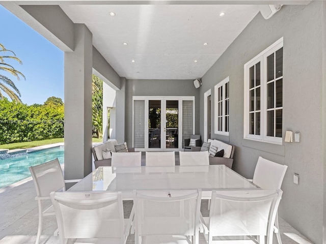 view of patio / terrace with an outdoor hangout area and french doors