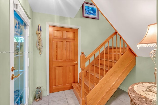 entrance foyer featuring light tile patterned floors