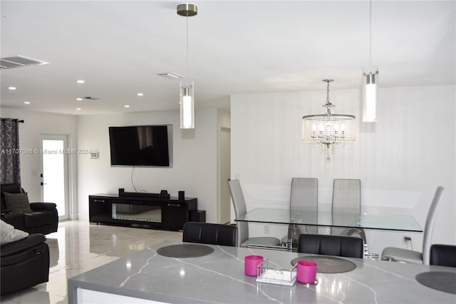 dining room featuring a chandelier