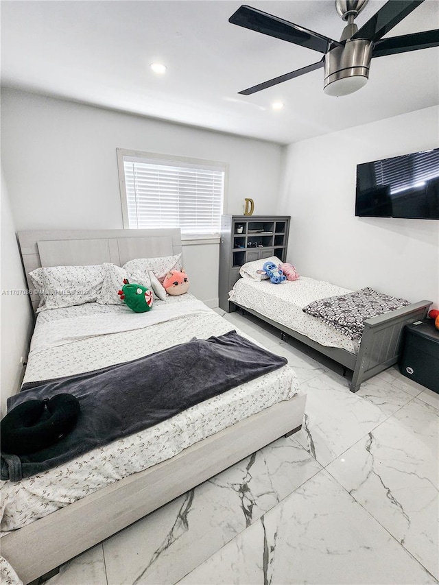 bedroom featuring ceiling fan