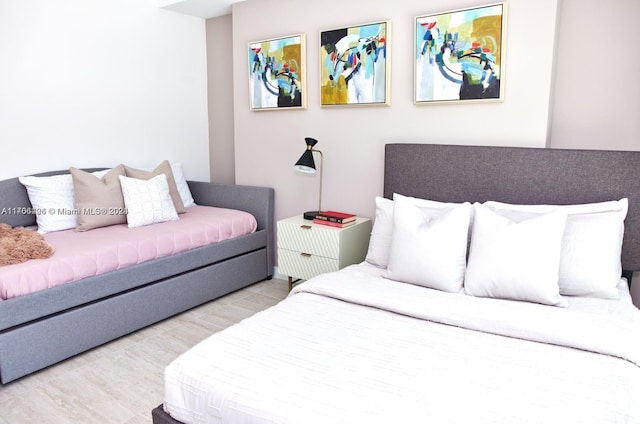 bedroom with wood-type flooring