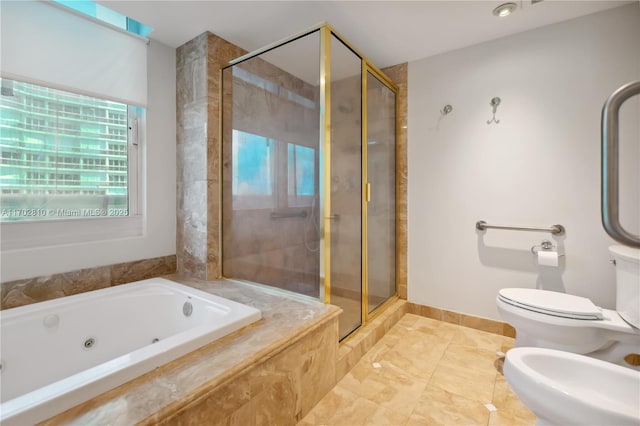 bathroom featuring toilet, shower with separate bathtub, and a bidet