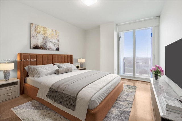 bedroom featuring light hardwood / wood-style floors