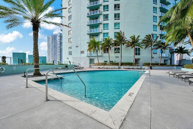 view of pool featuring a patio area