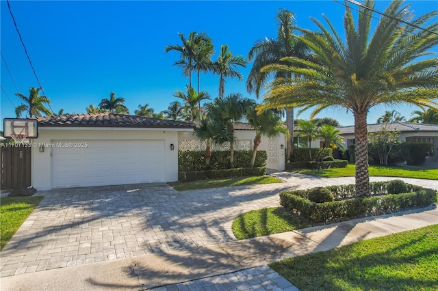 view of front of property featuring a garage