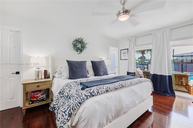 bedroom featuring ceiling fan and dark hardwood / wood-style flooring