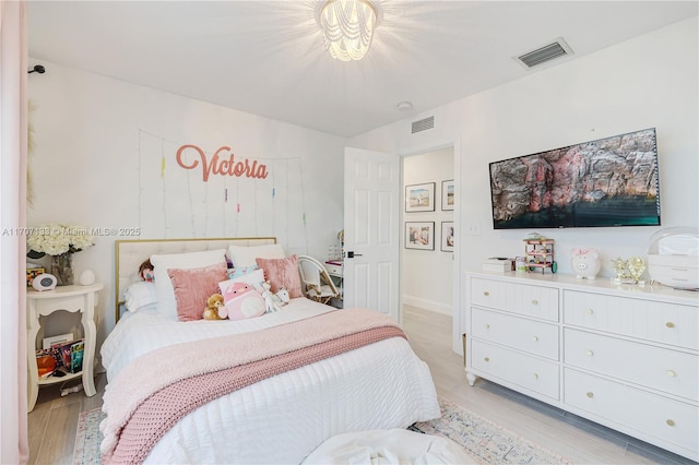 bedroom featuring light wood-type flooring