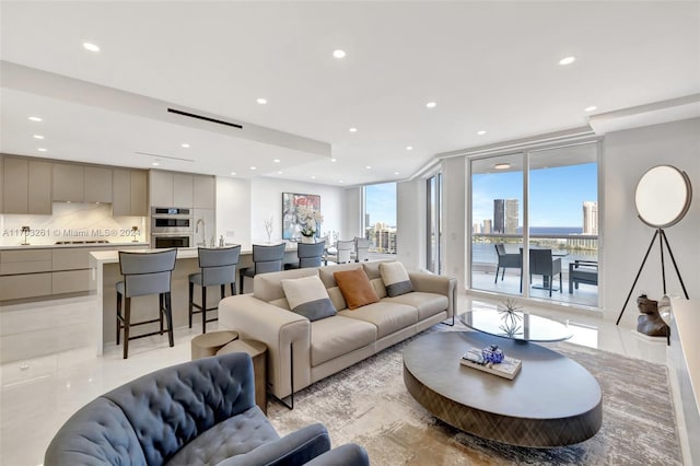 living room featuring light tile patterned flooring