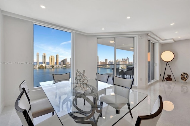 dining room with a water view