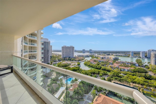 balcony featuring a water view