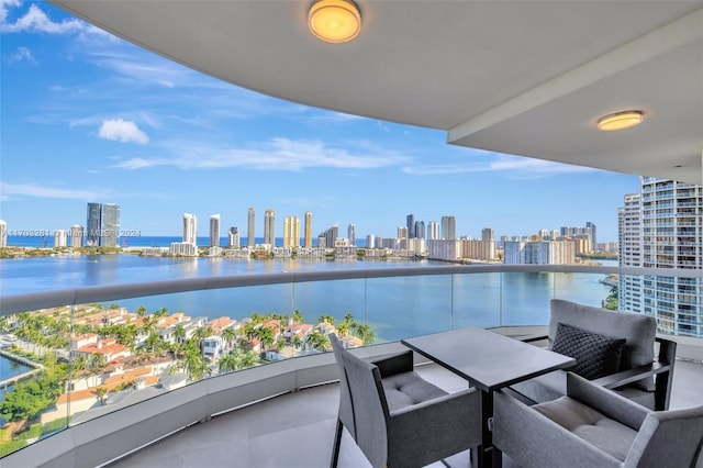 balcony featuring a water view