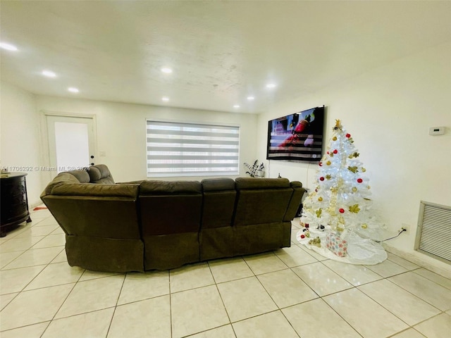 living room with light tile patterned floors