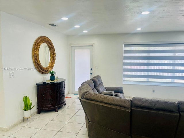 living room featuring light tile patterned floors