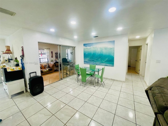 dining room with light tile patterned floors