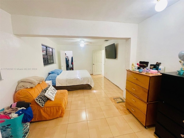 bedroom with light tile patterned floors