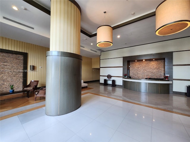 reception area featuring decorative columns