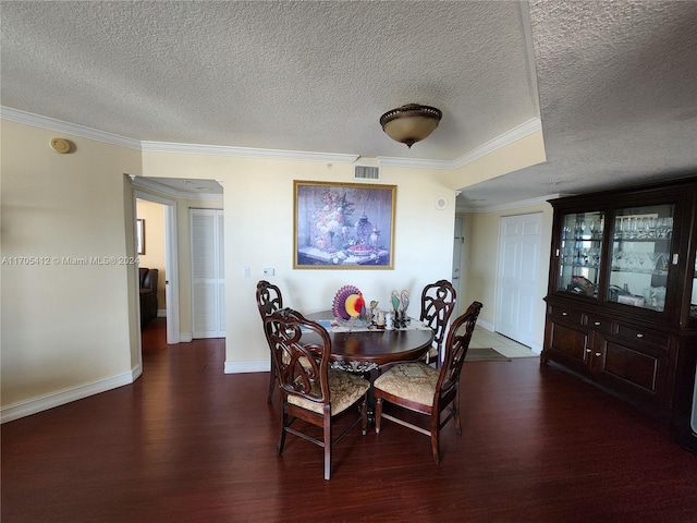 dining room with a textured ceiling, dark hardwood / wood-style flooring, and crown molding