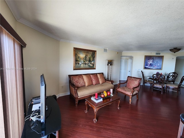 living room featuring wood-type flooring, a textured ceiling, and crown molding