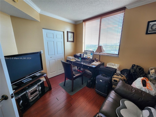 home office featuring dark hardwood / wood-style floors, ornamental molding, and a textured ceiling