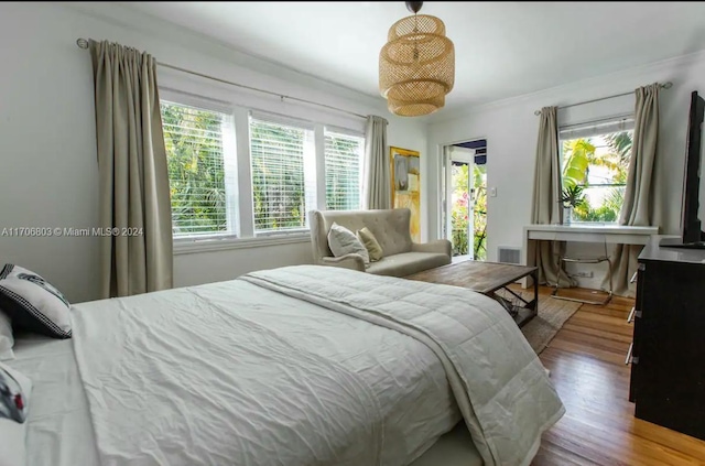 bedroom featuring wood-type flooring