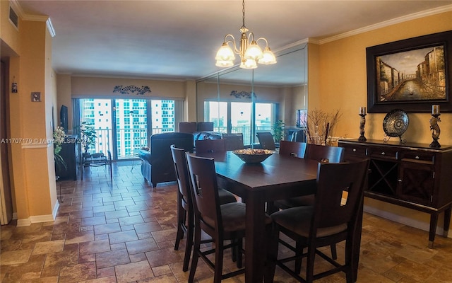 dining space featuring a chandelier and ornamental molding