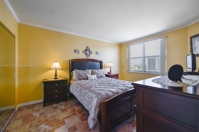 bedroom with crown molding