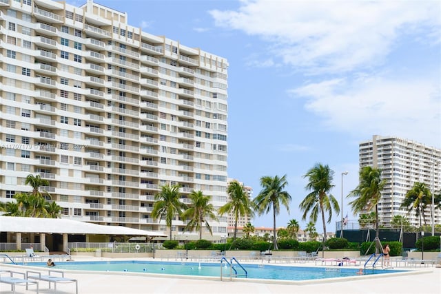 view of swimming pool with a patio area