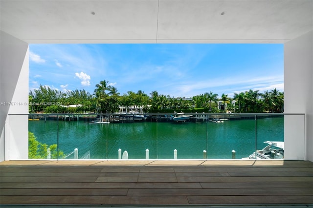 view of pool with a water view