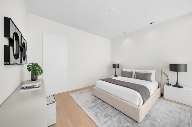 bedroom featuring light hardwood / wood-style flooring