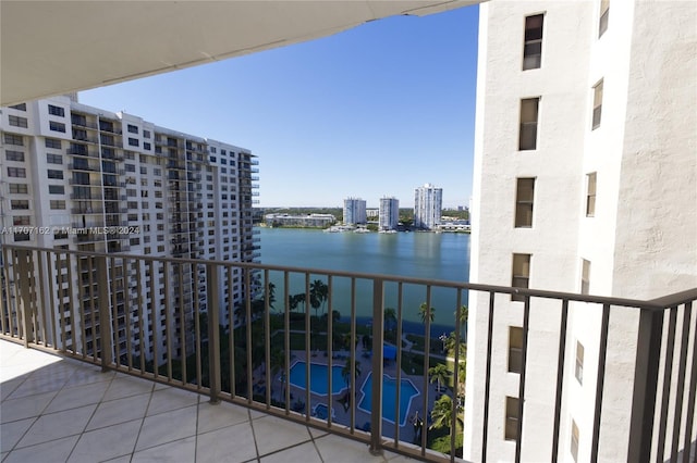 balcony featuring a water view