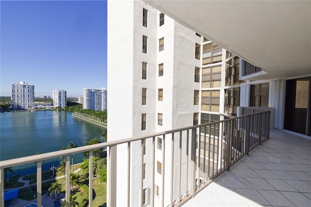 balcony featuring a water view