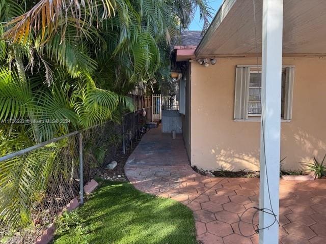 view of home's exterior with a patio area