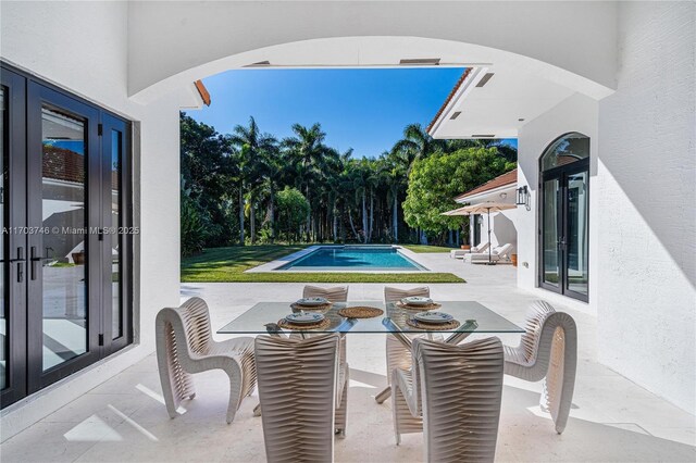 view of pool featuring a patio