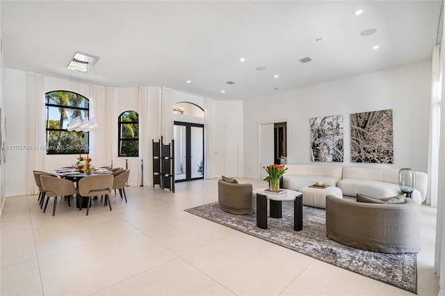 tiled living room with french doors