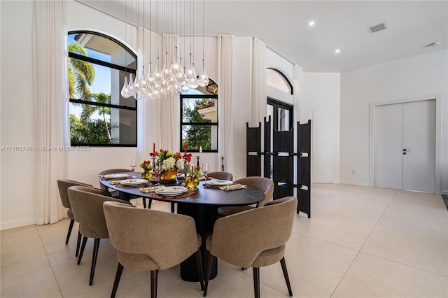 dining space with light tile patterned flooring