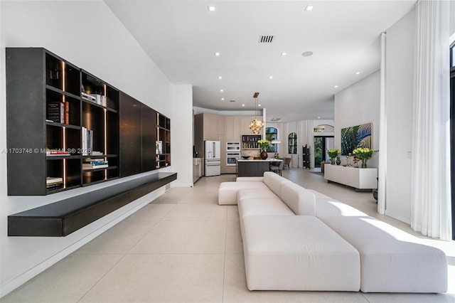 living room with light tile patterned floors